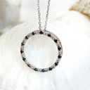 Black and white diamond halo pendant