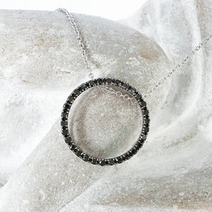 Elegance Defined Black Diamond in White Gold Halo Pendant