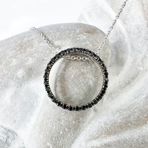 Elegance Defined Black Diamond in White Gold Halo Pendant