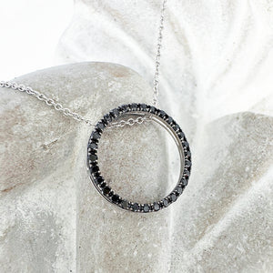 Elegance Defined Black Diamond in White Gold Halo Pendant