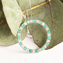 Elegance Defined Emerald And White Diamond in White Gold Halo Pendant
