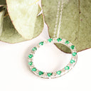 Elegance Defined Emerald And White Diamond in White Gold Halo Pendant