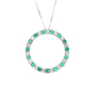 Elegance Defined Emerald And White Diamond in White Gold Halo Pendant