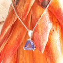 Elegant Double Claw Trilliant Cut Tanzanite Pendant