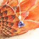 Elegant Double Claw Trilliant Cut Tanzanite Pendant