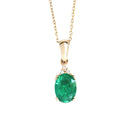 Elegant Oval Cut Emerald and Trilogy Diamond Pendant In Yellow Gold