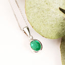Elegant Tube Set Oval Emerald and Diamond White Gold Pendant