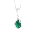 Elegant Tube Set Oval Emerald and Diamond White Gold Pendant