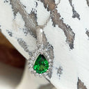 Elegantly Classic Pear Cut Tsavorite White Diamond Halo White Gold Pendant