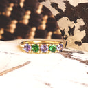 Elegantly Looped Gallery Tanzanite and Tsavorite Yellow Gold Ring