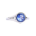 Elegantly Looped Sapphire and Diamond Ring