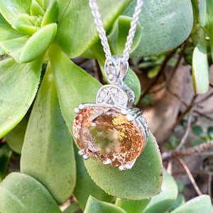 Elegantly Regal Peach Oval Morganite and Decorative Diamond Bale Pendant