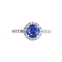 Elevated Blue Sapphire and Diamond Shoulder and Halo White Gold Ring