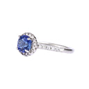 Elevated Blue Sapphire and Diamond Shoulder and Halo White Gold Ring