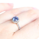 Elevated Blue Sapphire and Diamond Shoulder and Halo White Gold Ring