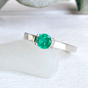 Elevated Caressing Gallery Emerald White Gold Ring