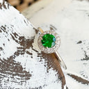 tsavorite and diamond halo ring