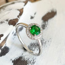 tsavorite and diamond halo ring