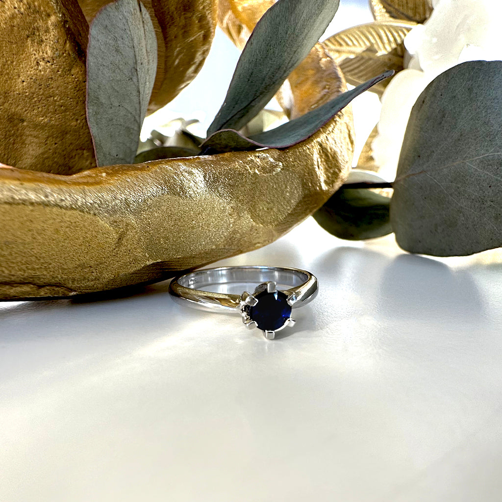 Elevated Six Claw Sapphire White Gold Ring