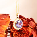 Enchanting Round Cut Tanzanite With Diamond Halo Yellow Gold Pendant