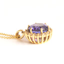 Enchanting Round Cut Tanzanite With Diamond Halo Yellow Gold Pendant