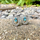 Exquisite Topaz and Diamond Halo Studs
