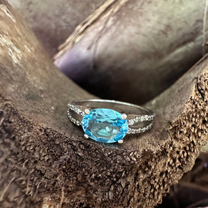 Fairytale Oval Blue Topaz with Split Shoulder Diamond Highlight White Gold Ring