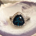 London Blue Topaz and Diamond Halo Ring