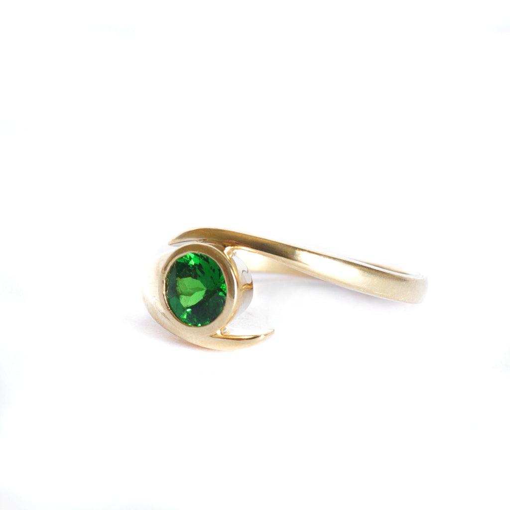 Flirty Twist and Turn Bezel Set Tsavorite Yellow Gold Ring