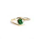 Flirty Twist and Turn Bezel Set Tsavorite Yellow Gold Ring