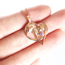For the Love of Elephants Rose Gold Tanzanite Pendant