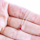 Four Claw Round Cut Ruby White Gold Pendant