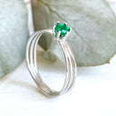 Iconic Three Band Round Cut Emerald White Gold Ring