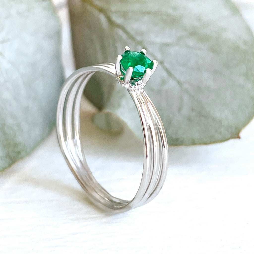 Iconic Three Band Round Cut Emerald White Gold Ring