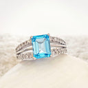 Blue Topaz and Diamond Band ring