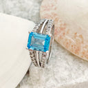 Blue Topaz and Diamond Band ring