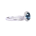 Glorious Teal Sapphire and Diamond Halo White Gold Ring and Band Set