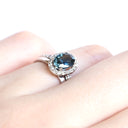Glorious Teal Sapphire and Diamond Halo White Gold Ring and Band Set