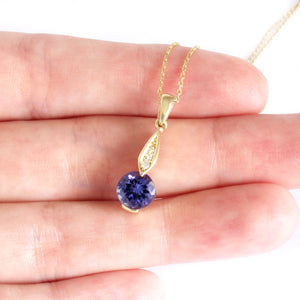 Golden Diamond Droplet Round Cut Tanzanite Yellow Gold Pendant