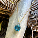 Gorgeous Blue Topaz With Trilogy Diamond Highlight Yellow Gold Pendant And Chain