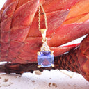 Gorgeous Cushion Cut Tanzanite And Trilogy Diamond Accent Yellow Gold Pendant