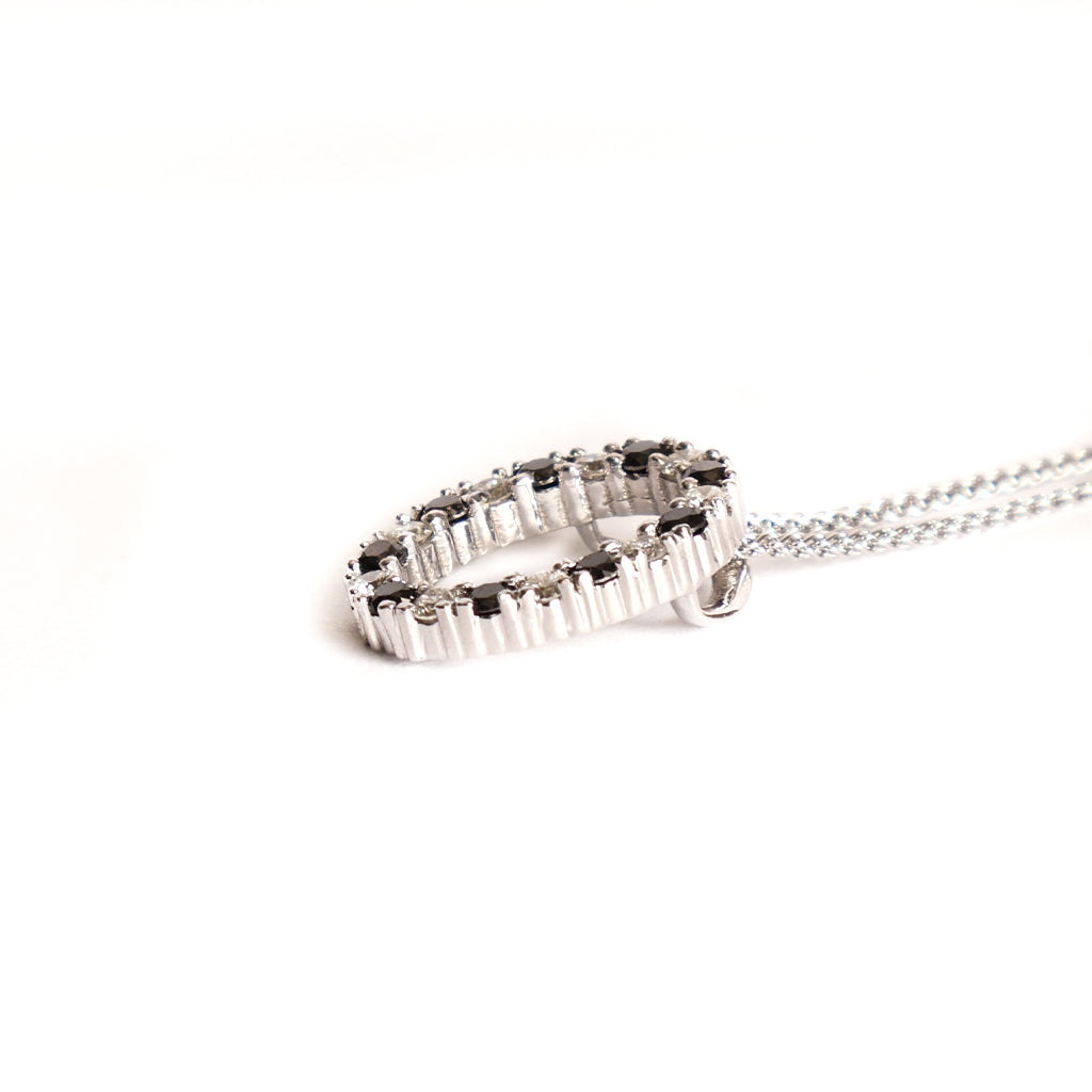 Gorgeous Oval Black and White Diamond Halo Pendant