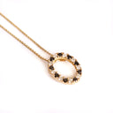 Gorgeous Oval Black and White Diamond Yellow Gold Halo Pendant