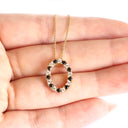 Gorgeous Oval Black and White Diamond Yellow Gold Halo Pendant