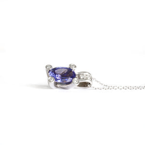 Gorgeous Oval Cut Tanzanite with Diamond Claw, Bale and Band Accent Pendant