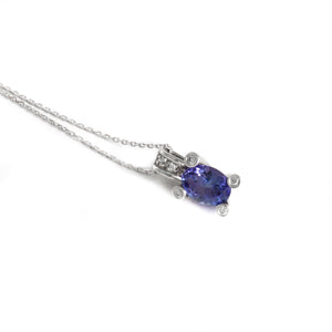 Gorgeous Oval Cut Tanzanite with Diamond Claw, Bale and Band Accent Pendant