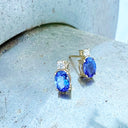 Gorgeous Oval Tanzanite and White Highlight Yellow Gold StudsGorgeous Oval Tanzanite and White Highlight Yellow Gold Studs