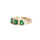 Gorgeous Trilogy Oval Tsavorite and Double Diamond Accent Ring