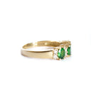 Gorgeous Trilogy Oval Tsavorite and Double Diamond Accent Ring