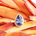 Grace Defined Pear Shaped Diamond Halo and Tanzanite Yellow Gold Ring